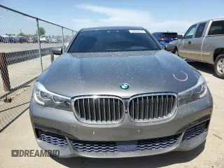 2017 BMW 7 Series 740i with VIN WBA7E2C55HG739108, listed as a Copart auction lot 53304715 with 114,510 mi miles and Salvage title. Bid and sale history available at DreamBid. Image 5.