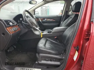 2013 Lincoln MKX z VIN 2LMDJ8JK6DBL01017, wystawiony jako Copart lot #58862985 z przebiegiem 216 753 mil mil oraz Szkoda całkowita • Salvage title. Historia ofert i sprzedaży dostępna na DreamBid. Obrazek 7.