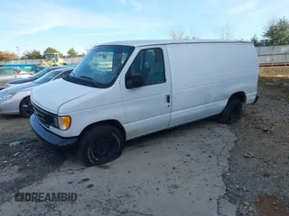 2003 Ford Econoline Cargo with VIN 1FTRE14263HA39384, listed as a IAAI auction lot 41267380 with 317,767 mi miles and . Bid and sale history available at DreamBid. Image 2.