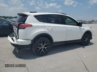 2018 Toyota RAV4 Hybrid SE with VIN JTMJJREVXJD212926, listed as a Copart auction lot 60215465 with 71,876 mi miles and Salvage title. Bid and sale history available at DreamBid. Image 3.