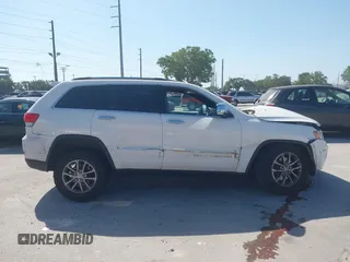 2014 Jeep Grand Cherokee Limited with VIN 1C4RJFBG7EC236572, listed as a IAAI auction lot 42134807 with 170,342 mi miles and . Bid and sale history available at DreamBid. Image 13.