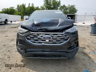 2020 Ford Edge Titanium z VIN 2FMPK4K97LBA56544, wystawiony jako Copart lot #59314005 z przebiegiem 84 861 mil mil oraz Czysty tytuł • Clean title. Historia ofert i sprzedaży dostępna na DreamBid. Obrazek 5.