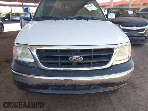 1997 Ford F-150 z VIN 1FTDX08W4VKC89238, wystawiony jako IAAI lot #42132010 z przebiegiem 204 386 mil mil oraz . Historia ofert i sprzedaży dostępna na DreamBid. Obrazek 6.