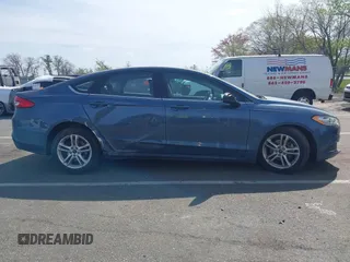 2018 Ford Fusion SE z VIN 3FA6P0H74JR176113, wystawiony jako IAAI lot #42074916 z przebiegiem 78 940 mil mil oraz . Historia ofert i sprzedaży dostępna na DreamBid. Obrazek 13.