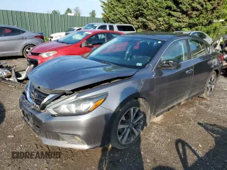 2016 Nissan Altima S with VIN 1N4AL3AP6GC128895, listed as a Copart auction lot 63986975 with 153,776 mi miles and Clean title. Bid and sale history available at DreamBid. Image 1.