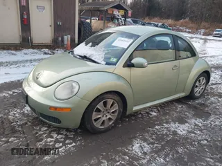2008 Volkswagen New Beetle Coupe S with VIN 3VWPG31C68M518009, listed as a IAAI auction lot 40982053 with 156,552 mi miles. Bid and sale history available at carsss.com. Image 2.