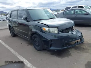 2013 Scion xB with VIN JTLZE4FEXDJ039668, listed as a IAAI auction lot 41809597 with 239,861 mi miles. Bid and sale history available at carsss.com. Image 1.