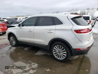 2019 Lincoln MKC Standard with VIN 5LMCJ1D9XKUL26787, listed as a Copart auction lot 40276364 with 81,052 mi miles and . Bid and sale history available at DreamBid. Image 2.
