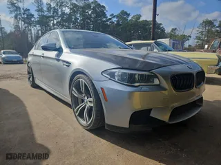 2016 BMW M5 with VIN WBSFV9C56GG343672, listed as a Copart auction lot 44406554 with 84,402 mi miles. Bid and sale history available at carsss.com. Image 1.