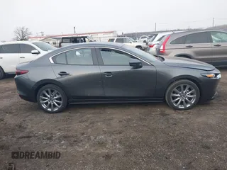 2023 Mazda 3 S Select with VIN 3MZBPABM2PM354066, listed as a IAAI auction lot 41339983 with 13,536 mi miles and . Bid and sale history available at DreamBid. Image 13.