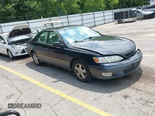 1997 Lexus ES 300 z VIN JT8BF22G3V0002456, wystawiony jako IAAI lot #42713889 z przebiegiem 230 445 mil mil oraz . Historia ofert i sprzedaży dostępna na DreamBid. Obrazek 1.