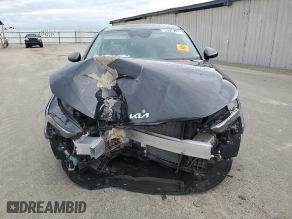 2025 Kia K5 LXS with VIN KNAG24J77S5320351, listed as a Copart auction lot 48920775 with 3,150 mi miles and Salvage Title. Bid and sale history available at carsss.com. Image 5.
