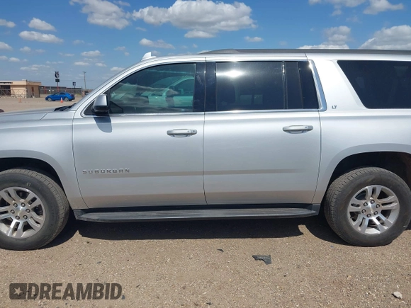 2017 Chevrolet Suburban LT with VIN 1GNSCHKC9HR287701, listed as a IAAI auction lot 42510491 with 166,568 mi miles and . Bid and sale history available at DreamBid. Image 14.