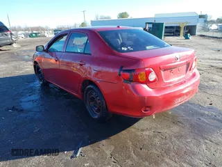 2009 Toyota Corolla with VIN JTDBL40E99J004929, listed as a IAAI auction lot 41210936 with 135,663 mi miles. Bid and sale history available at carsss.com. Image 3.