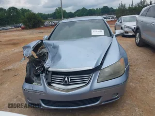 2006 Acura RL z VIN JH4KB16576C002362, wystawiony jako IAAI lot #42364606 z przebiegiem 189 746 mil mil oraz . Historia ofert i sprzedaży dostępna na DreamBid. Obrazek 12.