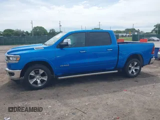 2021 Ram 1500 Laramie with VIN 1C6SRFJT1MN774879, listed as a IAAI auction lot 42242318 with 51,971 mi miles and . Bid and sale history available at DreamBid. Image 15.