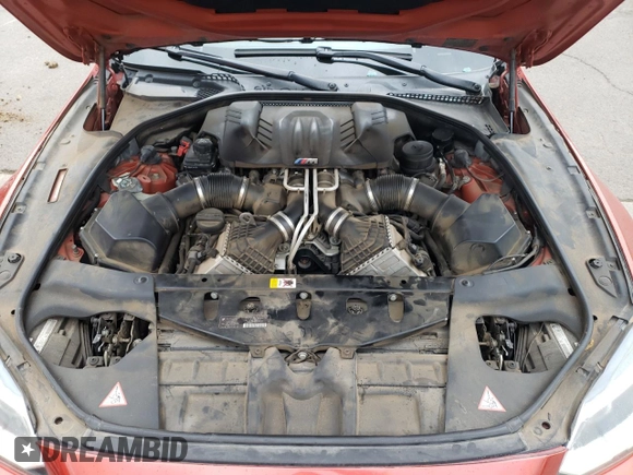 2014 BMW M6 z VIN WBSLX9C52ED160071, wystawiony jako Copart lot #77452554 z przebiegiem 64 814 mil mil oraz Szkoda całkowita • Salvage title. Historia ofert i sprzedaży dostępna na DreamBid. Obrazek 13.