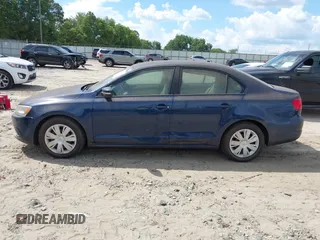 2012 Volkswagen Jetta SE with VIN 3VWDX7AJXCM321247, listed as a IAAI auction lot 42847011 with 232,459 mi miles and . Bid and sale history available at DreamBid. Image 6.