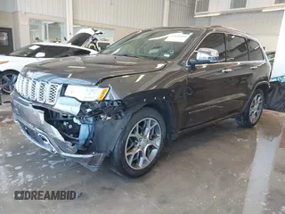 2020 Jeep Grand Cherokee Overland with VIN 1C4RJFCGXLC419668, listed as a IAAI auction lot 41608508 with 104,088 mi miles. Bid and sale history available at carsss.com. Image 2.