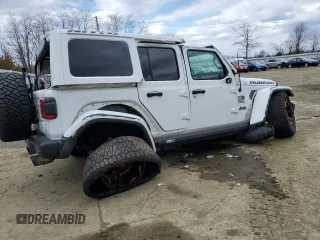 2018 Jeep Wrangler Unlimited Rubicon with VIN 1C4HJXFGXJW244945, listed as a Copart auction lot 49893645 with 45,802 mi miles and Salvage title. Bid and sale history available at DreamBid. Image 3.