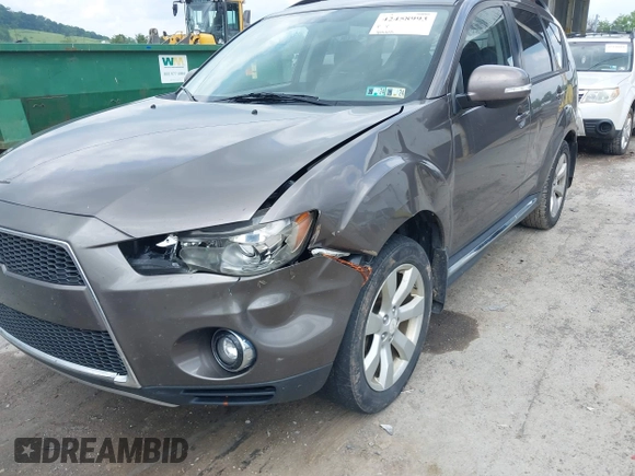 2010 Mitsubishi Outlander XLS z VIN JA4JT4AX6AZ003099, wystawiony jako IAAI lot #42458993 z przebiegiem 218 614 mil mil oraz . Historia ofert i sprzedaży dostępna na DreamBid. Obrazek 6.