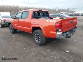 2018 Toyota Tacoma SR with VIN 3TMCZ5AN4JM161623, listed as a IAAI auction lot 41677439 with 75,549 mi miles. Bid and sale history available at carsss.com. Image 3.