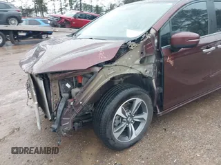 2019 Honda Odyssey Touring with VIN 5FNRL6H82KB060023, listed as a IAAI auction lot 41451199 with 82,994 mi miles. Bid and sale history available at carsss.com. Image 19.