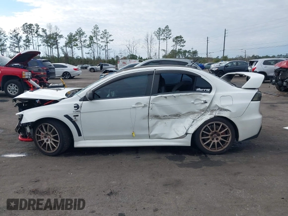 2011 Mitsubishi Lancer Evolution GSR with VIN JA32W8FV9BU045781, listed as a IAAI auction lot 41308314 with 102,840 mi miles. Bid and sale history available at carsss.com. Image 15.