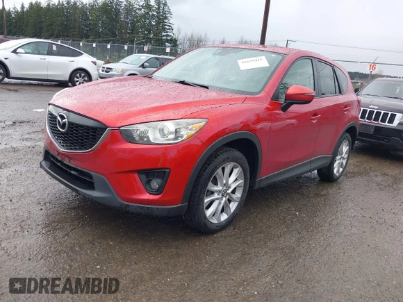 2015 Mazda CX-5 Grand Touring with VIN JM3KE4DY0F0479392, listed as a IAAI auction lot 41659415 with 141,403 mi miles. Bid and sale history available at carsss.com. Image 17.
