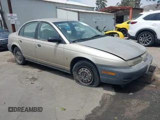 1998 Saturn SL z VIN 1G8ZH5281WZ230144, wystawiony jako IAAI lot #42142370 z przebiegiem 174 830 mil mil oraz . Historia ofert i sprzedaży dostępna na DreamBid. Obrazek 1.