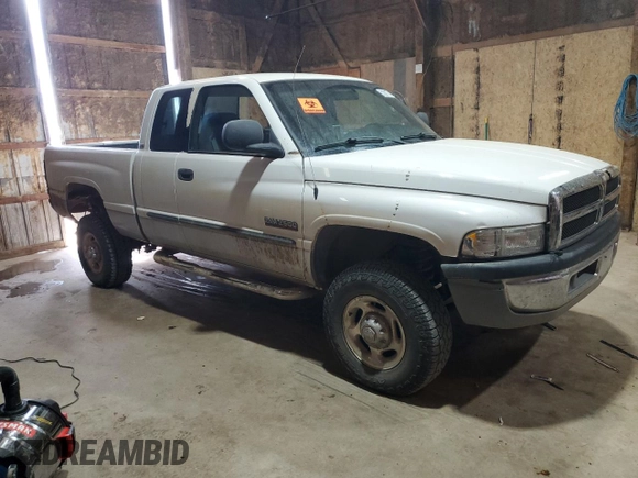 2002 Dodge 2500 z VIN 3B7KF236X2M256911, wystawiony jako Copart lot #51001775 z przebiegiem 208 199 mil mil oraz Tytuł czysty. Historia ofert i sprzedaży dostępna na DreamBid. Obrazek 4.