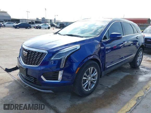 2023 Cadillac XT5 FWD Premium Luxury with VIN 1GYKNCRS4PZ151486, listed as a IAAI auction lot 42099826 with 42,274 mi miles and . Bid and sale history available at DreamBid. Image 2.