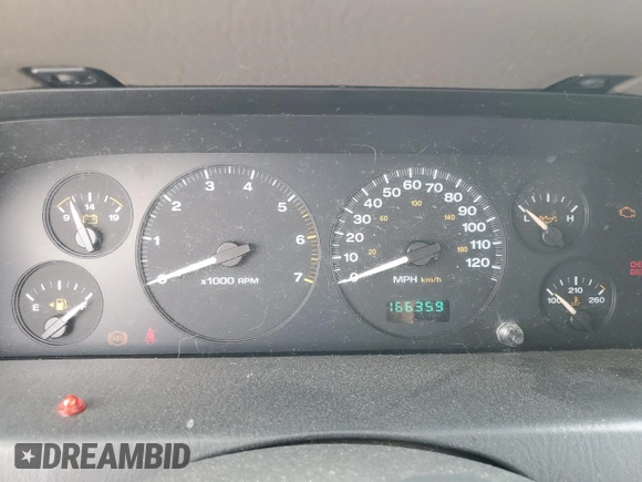 2004 Jeep Grand Cherokee Laredo with VIN 1J4GW48S64C121057, listed as a Copart auction lot 67765474 with 166,359 mi miles and Salvage title. Bid and sale history available at DreamBid. Image 9.