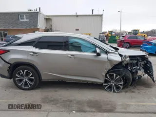 2021 Lexus RX with VIN 2T2HZMDA4MC305057, listed as a IAAI auction lot 41706486 with 37,518 mi miles. Bid and sale history available at carsss.com. Image 14.