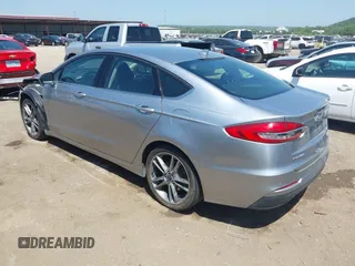 2020 Ford Fusion SEL with VIN 3FA6P0CDXLR196124, listed as a IAAI auction lot 42244231 with 99,306 mi miles and . Bid and sale history available at DreamBid. Image 3.