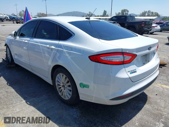 2016 Ford Fusion Energi SE Luxury with VIN 3FA6P0PU7GR206589, listed as a IAAI auction lot 42002565 with 215,789 mi miles. Bid and sale history available at carsss.com. Image 3.