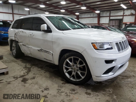 2015 Jeep Grand Cherokee Summit with VIN 1C4RJFJG9FC794992, listed as a Copart auction lot 42790355 with 74,044 mi miles and Salvage Title. Bid and sale history available at DreamBid. Image 4.
