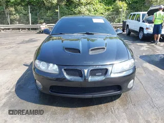 2005 Pontiac GTO z VIN 6G2VX12U85L367278, wystawiony jako IAAI lot #42140119 z przebiegiem 121 397 mil mil oraz . Historia ofert i sprzedaży dostępna na DreamBid. Obrazek 12.