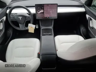 2021 Tesla Model Y Long Range with VIN 5YJYGDEE1MF267004, listed as a Copart auction lot 88708485 with 65,669 mi miles and Salvage Title. Bid and sale history available at DreamBid. Image 8.