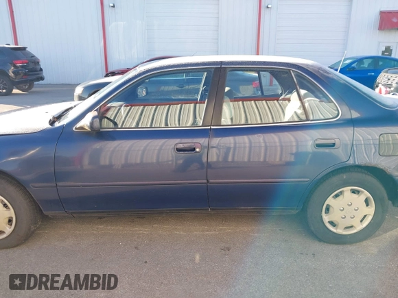 1994 Toyota Camry LE with VIN 4T1SK12EXRU374215, listed as a IAAI auction lot 41581093 with 80,397 mi miles. Bid and sale history available at carsss.com. Image 14.