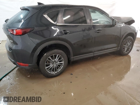 2021 Mazda CX-5 Sport with VIN JM3KFABM4M0334722, listed as a Copart auction lot 44021125 with 64,590 mi miles and Clean Title. Bid and sale history available at carsss.com. Image 3.