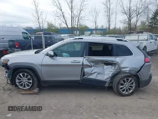2019 Jeep Cherokee Latitude with VIN 1C4PJLCB6KD159997, listed as a IAAI auction lot 42102904 with 72,064 mi miles and . Bid and sale history available at carsss.com. Image 14.