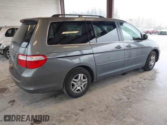 2007 Honda Odyssey EX with VIN 5FNRL38417B054717, listed as a IAAI auction lot 41955733 with 157,076 mi miles. Bid and sale history available at carsss.com. Image 4.
