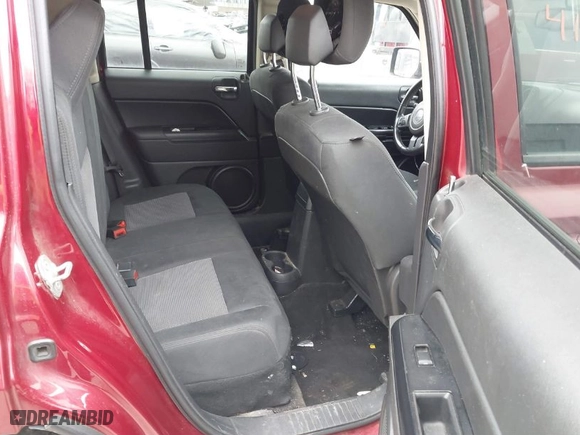 2014 Jeep Patriot Latitude with VIN 1C4NJRFB6ED540761, listed as a IAAI auction lot 41902225 with 216,442 mi miles. Bid and sale history available at carsss.com. Image 8.