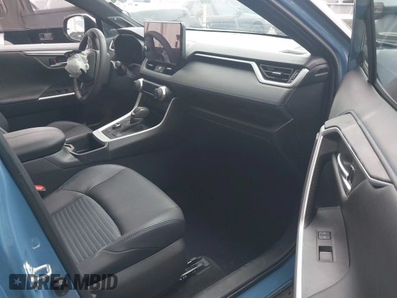 2023 Toyota RAV4 Hybrid XSE with VIN 2T3E6RFV4PW039496, listed as a IAAI auction lot 42488695 with 13,533 mi miles and . Bid and sale history available at DreamBid. Image 5.