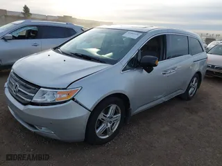 2012 Honda Odyssey Touring with VIN 5FNRL5H96CB095264, listed as a IAAI auction lot 41403450 with 246,199 mi miles. Bid and sale history available at carsss.com. Image 6.