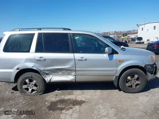 2007 Honda Pilot EX-L with VIN 2HKYF18597H514837, listed as a IAAI auction lot 41800365 with 194,341 mi miles. Bid and sale history available at carsss.com. Image 13.