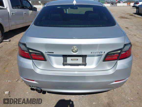 2014 BMW 5 Series 528i xDrive with VIN WBA5A7C5XED612822, listed as a IAAI auction lot 41701488 with 120,939 mi miles and . Bid and sale history available at DreamBid. Image 16.