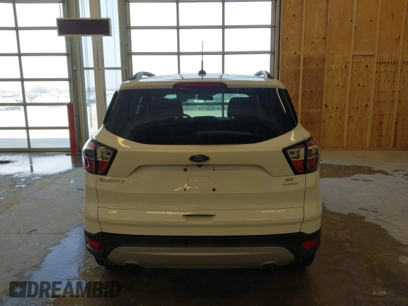 2017 Ford Escape SE z VIN 1FMCU0GD3HUC12658, wystawiony jako IAAI lot #41801033 z przebiegiem 107 662 mil mil oraz . Historia ofert i sprzedaży dostępna na DreamBid. Obrazek 16.