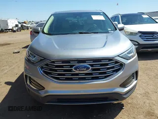 2021 Ford Edge SEL z VIN 2FMPK4J98MBA50772, wystawiony jako IAAI lot #42224052 z przebiegiem 76 061 mil mil oraz . Historia ofert i sprzedaży dostępna na DreamBid. Obrazek 6.